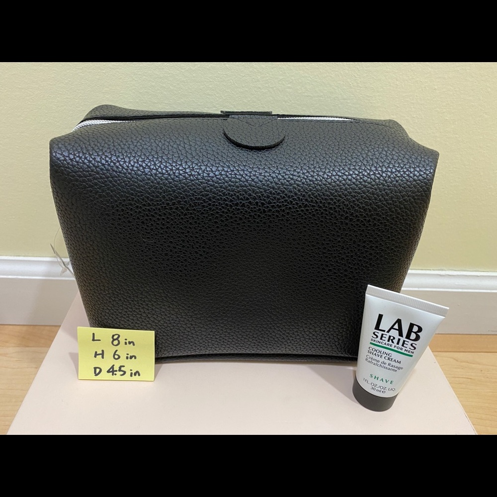 Men toiletry cosmetic travel bag and shave cream